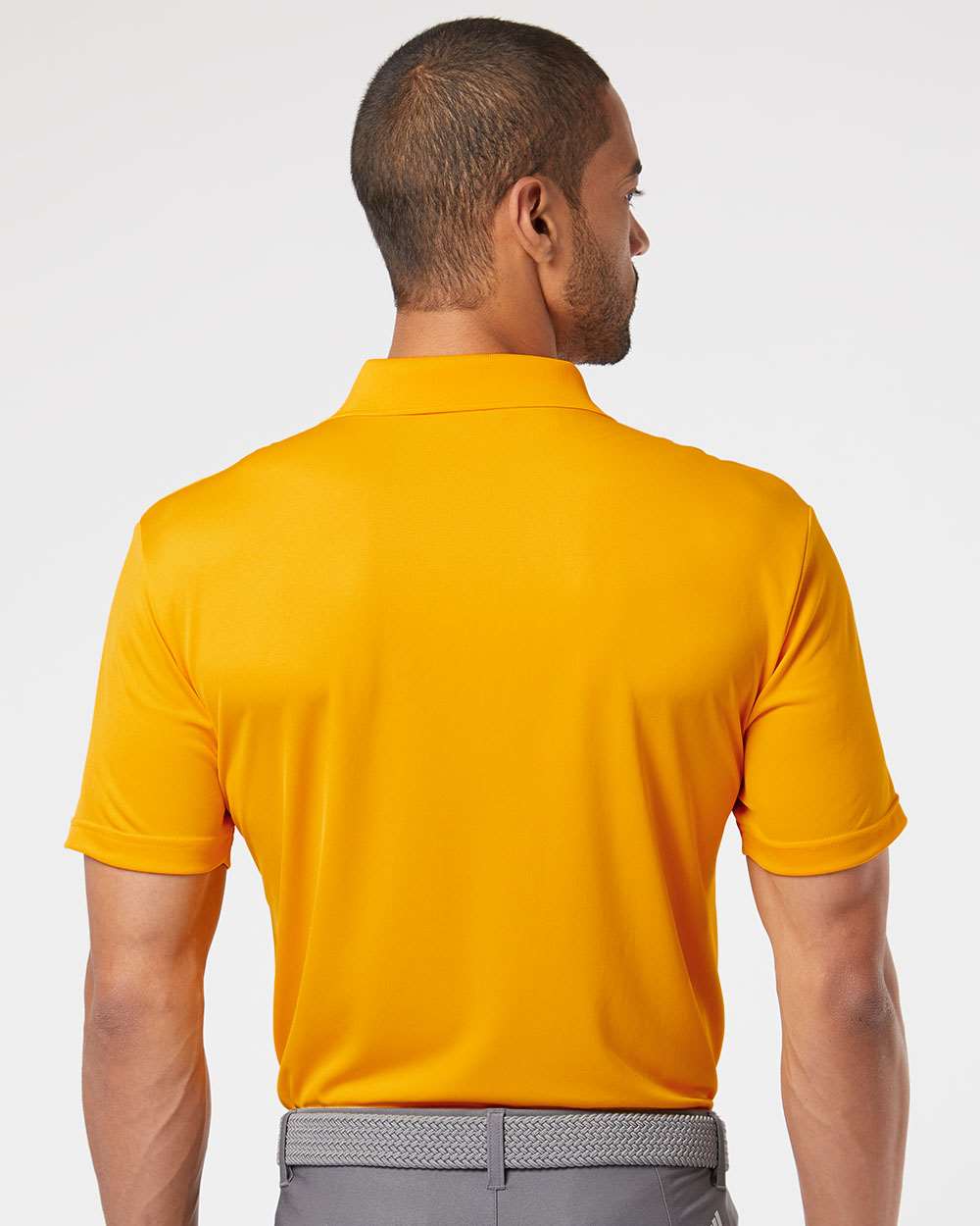Adidas A230 Collegiate Gold on model, back