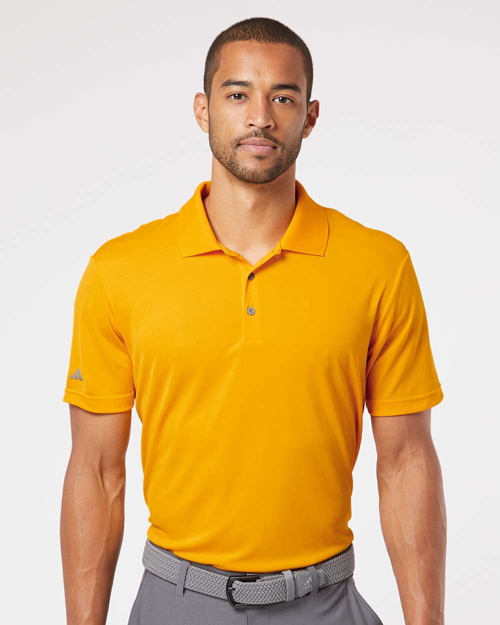 Adidas A230 Collegiate Gold on model, front